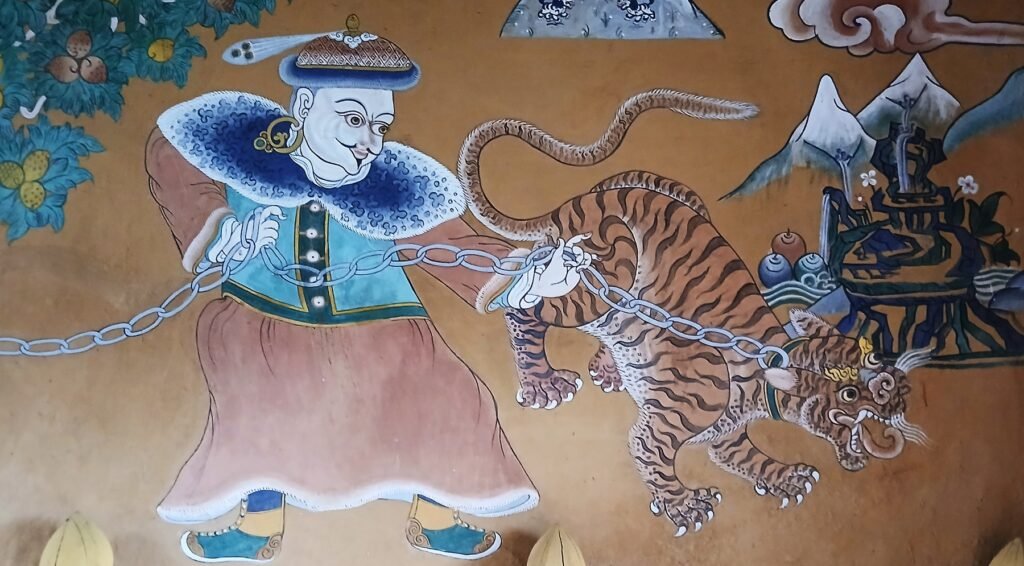 Wall art from a 14th century house, showing the symbolic importance of Tigers in Bhutanese life.